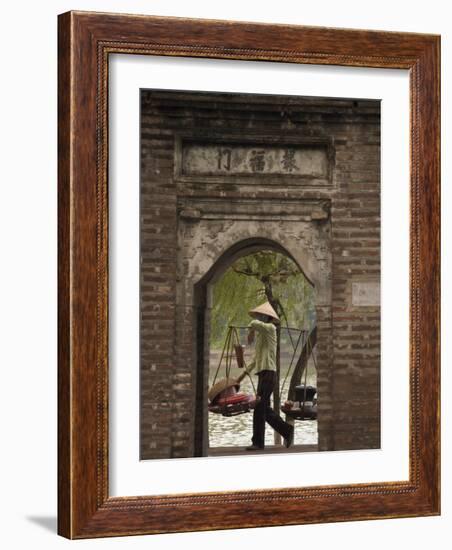 Lady Carrying Baskets, Hoan Kiem Lake, Hanoi, Northern Vietnam, Southeast Asia-Christian Kober-Framed Photographic Print