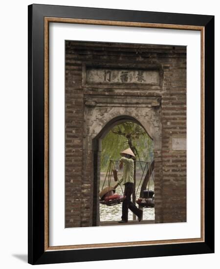 Lady Carrying Baskets, Hoan Kiem Lake, Hanoi, Northern Vietnam, Southeast Asia-Christian Kober-Framed Photographic Print