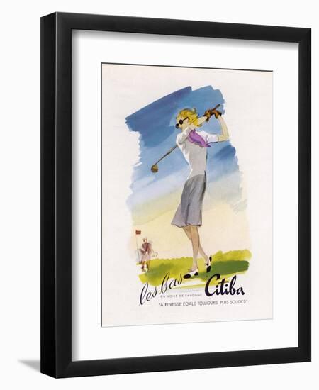 Lady Golfer Takes a Swing-null-Framed Photographic Print