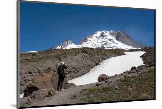 Lady hiker near a glacier on Mount Hood, part of the Cascade Range, Pacific Northwest region, Orego-Martin Child-Mounted Photographic Print