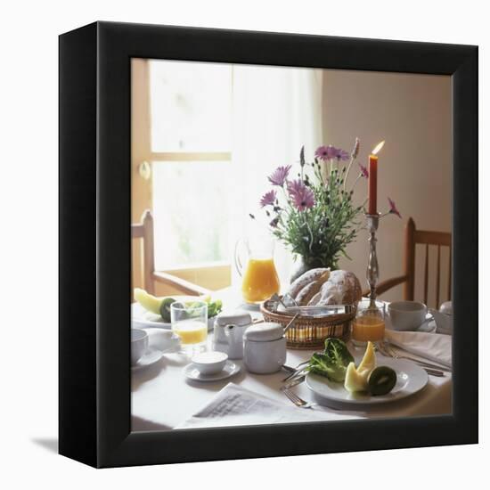 Laid Breakfast Table with Baked Goods, Juice and Fruit-null-Framed Premier Image Canvas
