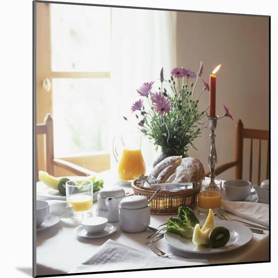 Laid Breakfast Table with Baked Goods, Juice and Fruit-null-Mounted Photographic Print
