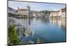 Lake Lucerne, Switzerland. Famous walking bridge and swans in river during the fall season.-Michele Niles-Mounted Photographic Print