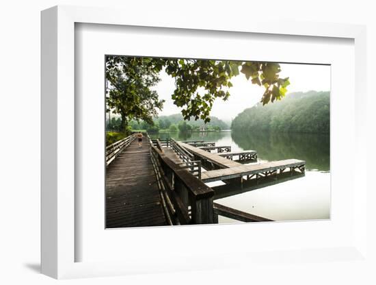 Lake Lure, North Carolina: a Man Goes for a Run Along the Shoreline of Lake Lure-Brad Beck-Framed Photographic Print