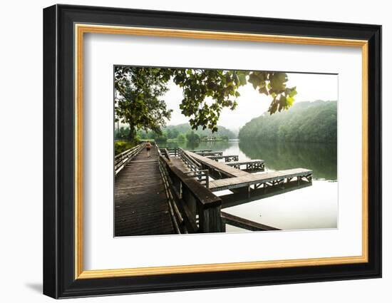 Lake Lure, North Carolina: a Man Goes for a Run Along the Shoreline of Lake Lure-Brad Beck-Framed Photographic Print