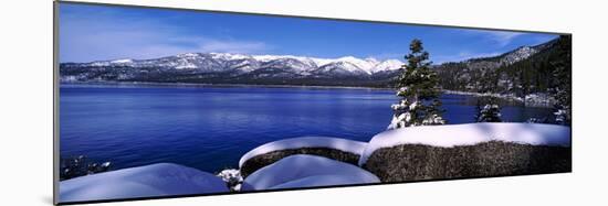 Lake with a Snowcapped Mountain Range in the Background, Sand Harbor, Lake Tahoe, California, USA-null-Mounted Photographic Print