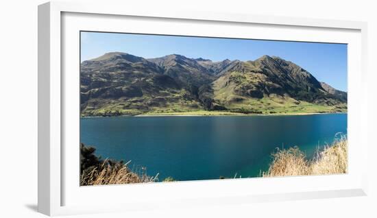 Lake with mountain range in the background, Lake Hawea, Makarora-Lake Hawea Road, State Highway...-null-Framed Photographic Print