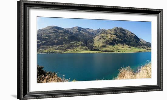 Lake with mountain range in the background, Lake Hawea, Makarora-Lake Hawea Road, State Highway...-null-Framed Photographic Print