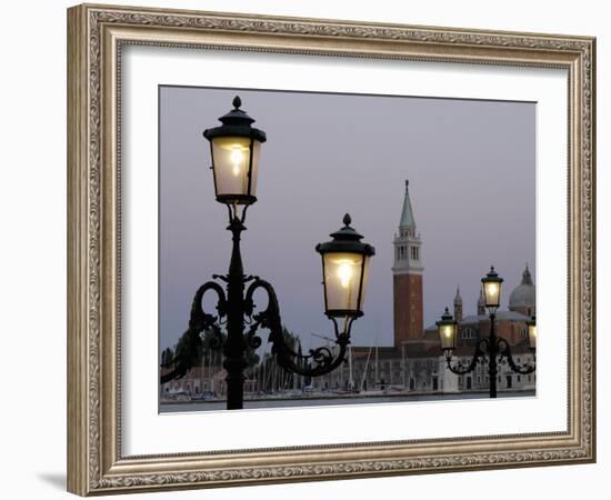 Lampposts Lit Up at Dusk with Building in the Background, San Giorgio Maggiore, Venice, Italy-null-Framed Photographic Print