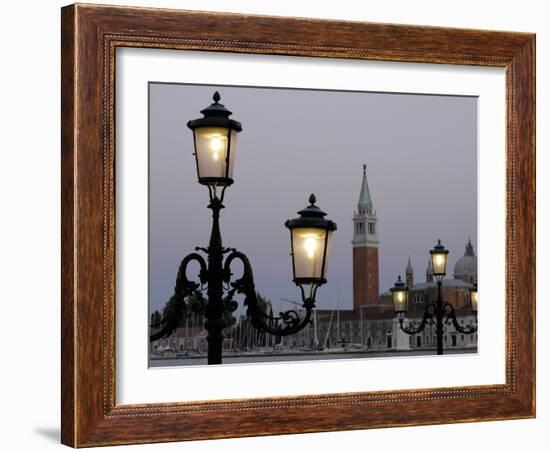 Lampposts Lit Up at Dusk with Building in the Background, San Giorgio Maggiore, Venice, Italy-null-Framed Photographic Print