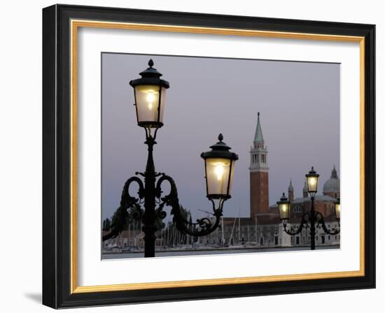 Lampposts Lit Up at Dusk with Building in the Background, San Giorgio Maggiore, Venice, Italy-null-Framed Photographic Print