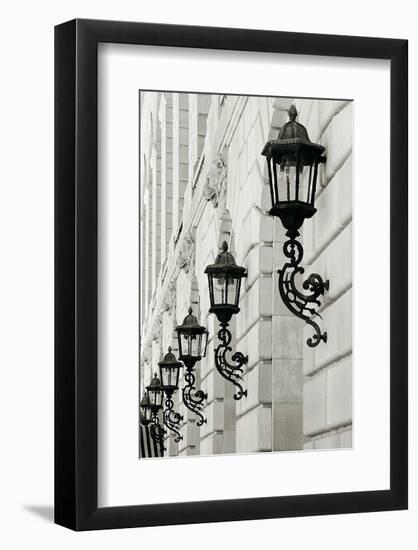 Lamps on Side of Building-Christian Peacock-Framed Art Print