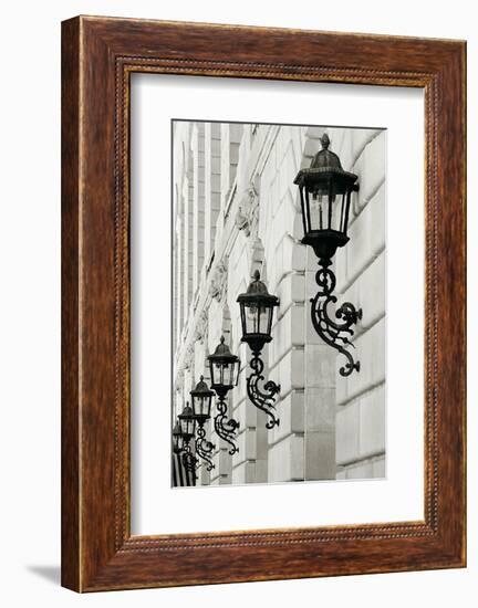 Lamps on Side of Building-Christian Peacock-Framed Art Print