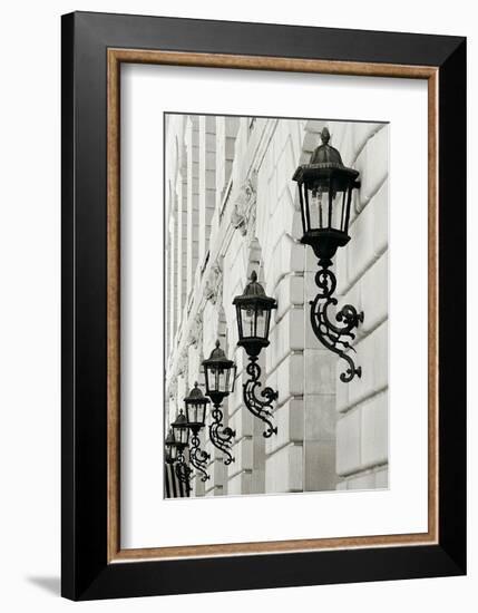 Lamps on Side of Building-Christian Peacock-Framed Art Print