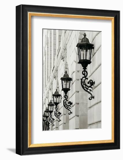 Lamps on Side of Building-Christian Peacock-Framed Art Print