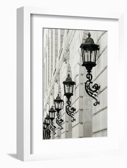 Lamps on Side of Building-Christian Peacock-Framed Art Print