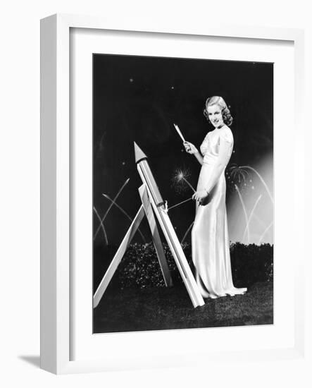 Lana Turner Celebrates with Firworks-null-Framed Photo