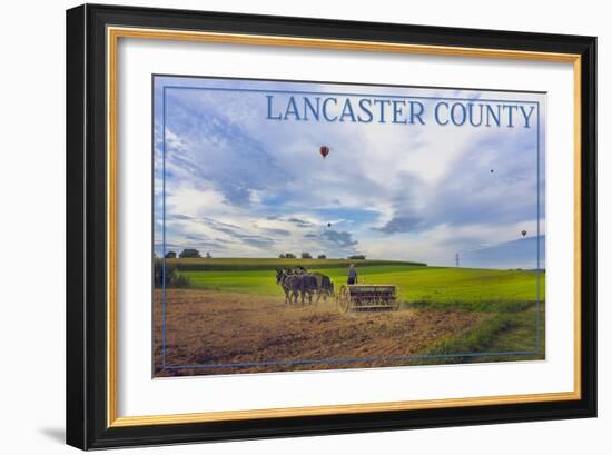 Lancaster County, Pennsylvania - Amish Farmer and Hot Air Balloons-Lantern Press-Framed Art Print