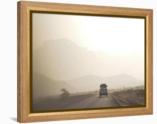 Land Cruiser Driving Along Dusty Road, Between Zagora and Tata, Morocco, North Africa, Africa-Jane Sweeney-Framed Premier Image Canvas