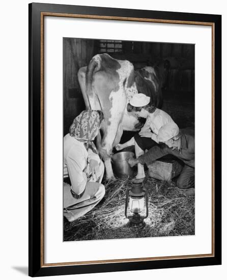 Land Girls Millking Cows on a Farm During World War II-Robert Hunt-Framed Photographic Print