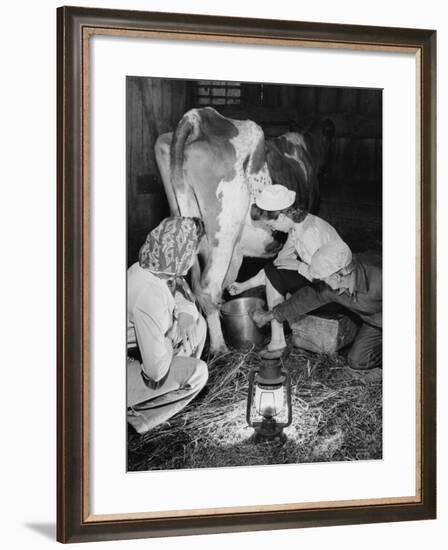 Land Girls Millking Cows on a Farm During World War II-Robert Hunt-Framed Photographic Print