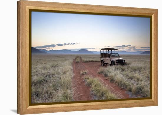 Land Rover Game Vehicle Parked by Sand Road at Sunrise-Lee Frost-Framed Premier Image Canvas