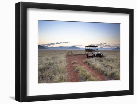 Land Rover Game Vehicle Parked by Sand Road at Sunrise-Lee Frost-Framed Photographic Print