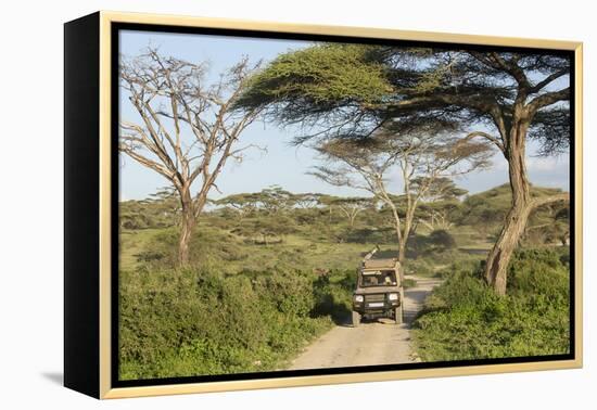 Landscape of the African Savanna with Safari Vehicle, Tanzania-James Heupel-Framed Premier Image Canvas