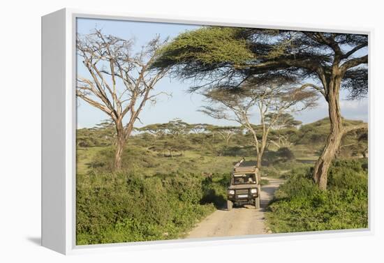 Landscape of the African Savanna with Safari Vehicle, Tanzania-James Heupel-Framed Premier Image Canvas