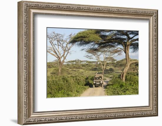 Landscape of the African Savanna with Safari Vehicle, Tanzania-James Heupel-Framed Photographic Print