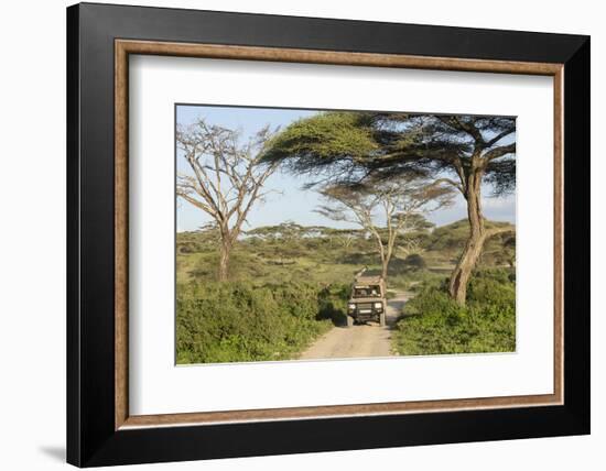 Landscape of the African Savanna with Safari Vehicle, Tanzania-James Heupel-Framed Photographic Print