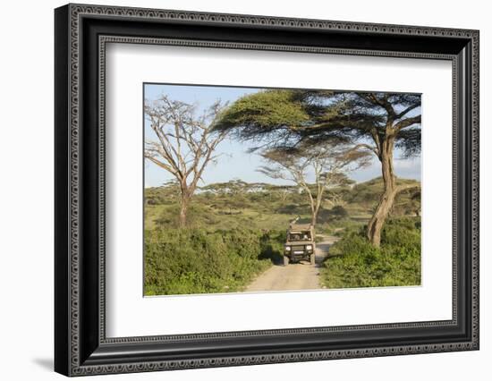 Landscape of the African Savanna with Safari Vehicle, Tanzania-James Heupel-Framed Photographic Print