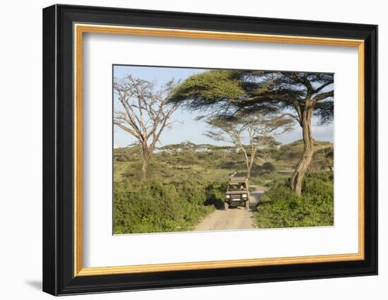 Landscape of the African Savanna with Safari Vehicle, Tanzania-James Heupel-Framed Photographic Print