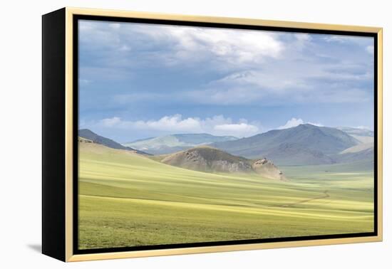 Landscape of the green Mongolian steppe under a gloomy sky, Ovorkhangai province, Mongolia, Central-Francesco Vaninetti-Framed Premier Image Canvas