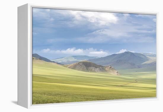 Landscape of the green Mongolian steppe under a gloomy sky, Ovorkhangai province, Mongolia, Central-Francesco Vaninetti-Framed Premier Image Canvas