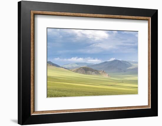 Landscape of the green Mongolian steppe under a gloomy sky, Ovorkhangai province, Mongolia, Central-Francesco Vaninetti-Framed Photographic Print