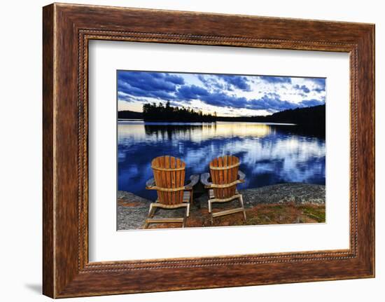 Landscape with Adirondack Chairs on Shore of Relaxing Lake at Sunset in Algonquin Park, Canada-elenathewise-Framed Photographic Print