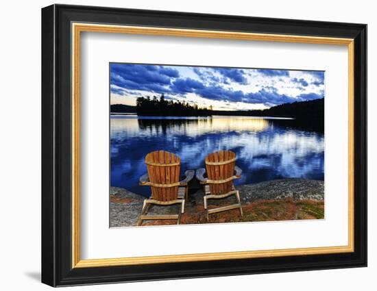 Landscape with Adirondack Chairs on Shore of Relaxing Lake at Sunset in Algonquin Park, Canada-elenathewise-Framed Photographic Print