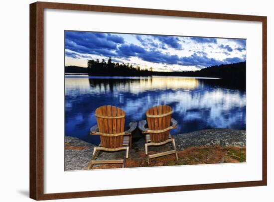 Landscape with Adirondack Chairs on Shore of Relaxing Lake at Sunset in Algonquin Park, Canada-elenathewise-Framed Photographic Print