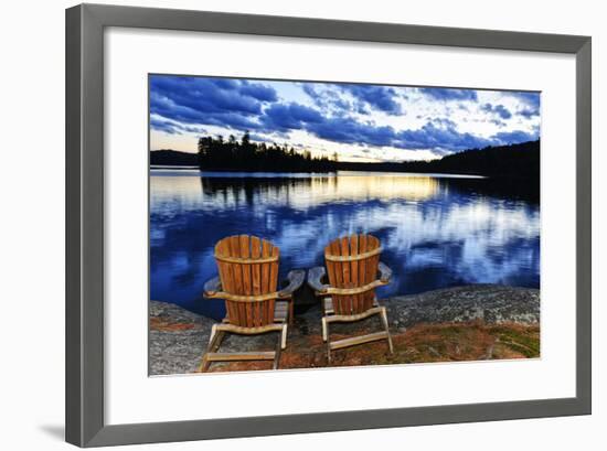 Landscape with Adirondack Chairs on Shore of Relaxing Lake at Sunset in Algonquin Park, Canada-elenathewise-Framed Photographic Print