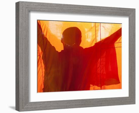 Laos, Vientiane, Monk Hanging Robes-Steve Vidler-Framed Photographic Print