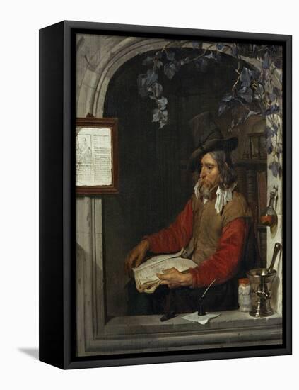 LApothicaire, dit aussi le Chimiste. The pharmacist, also called the chemist-Gabriel Metsu-Framed Premier Image Canvas