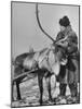Lapp Tribesman Tending to His Reindeer-Mark Kauffman-Mounted Photographic Print