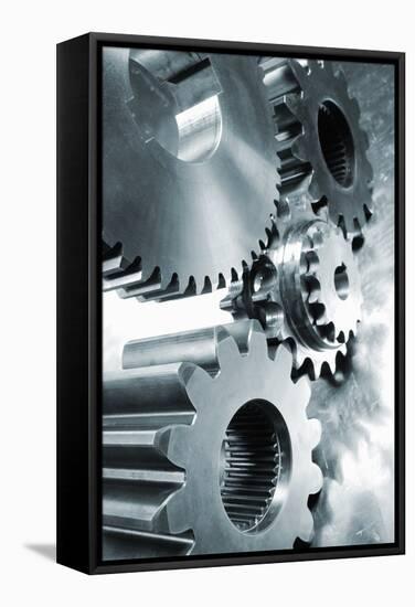 Large Industrial Gears Set Against Titanium And In A Blue Metallic Toning Concept-lagardie-Framed Stretched Canvas