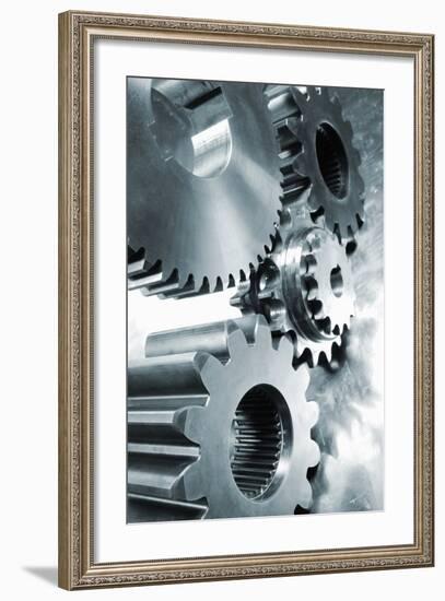 Large Industrial Gears Set Against Titanium And In A Blue Metallic Toning Concept-lagardie-Framed Art Print