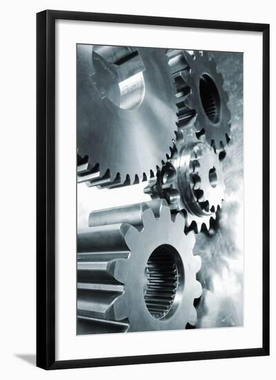 Large Industrial Gears Set Against Titanium And In A Blue Metallic Toning Concept-lagardie-Framed Art Print