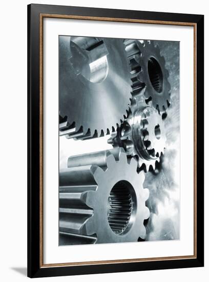 Large Industrial Gears Set Against Titanium And In A Blue Metallic Toning Concept-lagardie-Framed Art Print