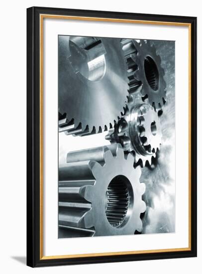 Large Industrial Gears Set Against Titanium And In A Blue Metallic Toning Concept-lagardie-Framed Art Print