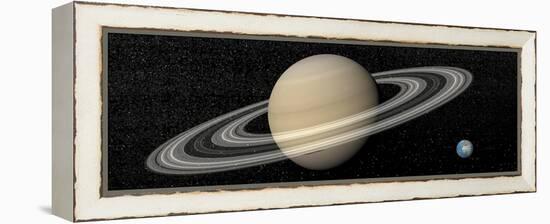 Large Planet Saturn and its Rings Next to Small Planet Earth-null-Framed Stretched Canvas