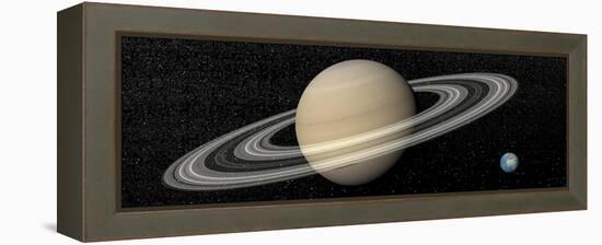 Large Planet Saturn and its Rings Next to Small Planet Earth-null-Framed Stretched Canvas